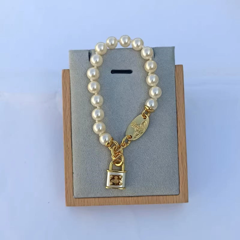 [DF]The Western Empress Dowager's lock bracelet is modeled after a pearl, Saturn, gold, French three-dimensional retro, and elegant light luxury jewelry