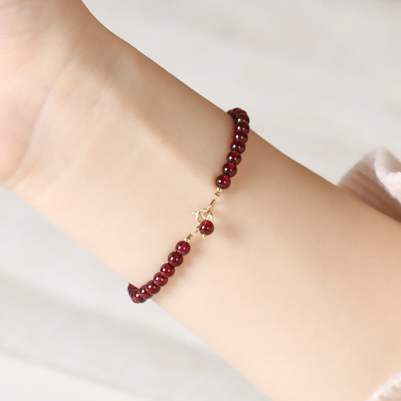 Pulsera de granate de diente morado natural con diseño de nicho