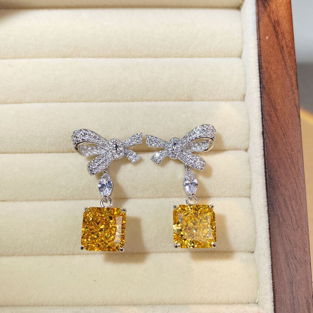 S925 sterling silver bow stud earrings are versatile and fashionable zirconia earrings