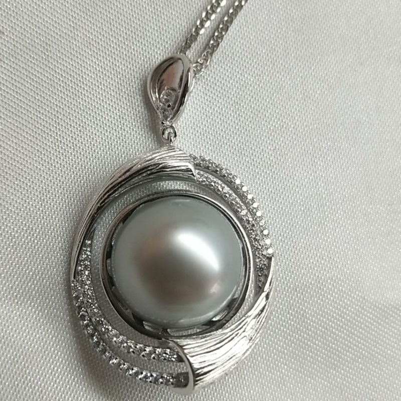 Colgante de perla redonda de plata 925 de Tahití Sea Pearl de 12-13 mm y color gris