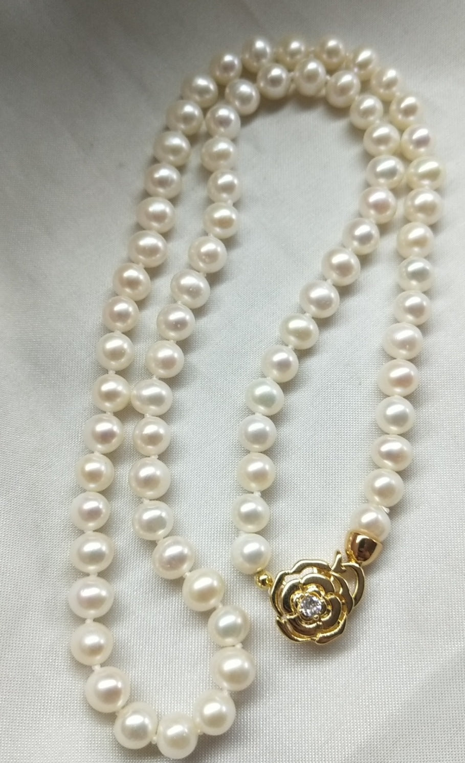 "Elegant Camellia" 6-7mm Near-Round High-Quality Freshwater Pearl Necklace - Graceful 50cm Necklace with Adjustable Clasp.