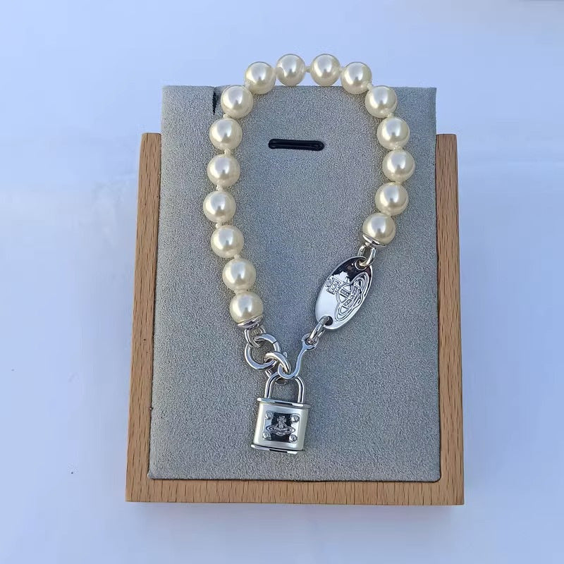 [DF]The Western Empress Dowager's lock bracelet is modeled after a pearl, Saturn, gold, French three-dimensional retro, and elegant light luxury jewelry