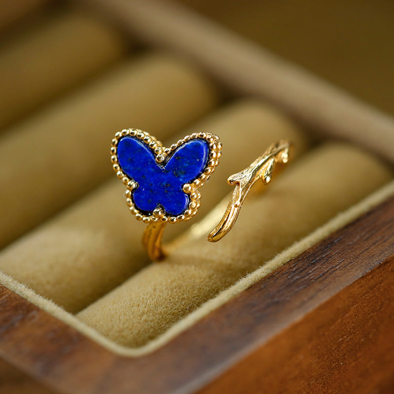 Anillo de lapislázuli con incrustaciones de oro y baño de plata S925 Anillo de apertura con forma de mariposa