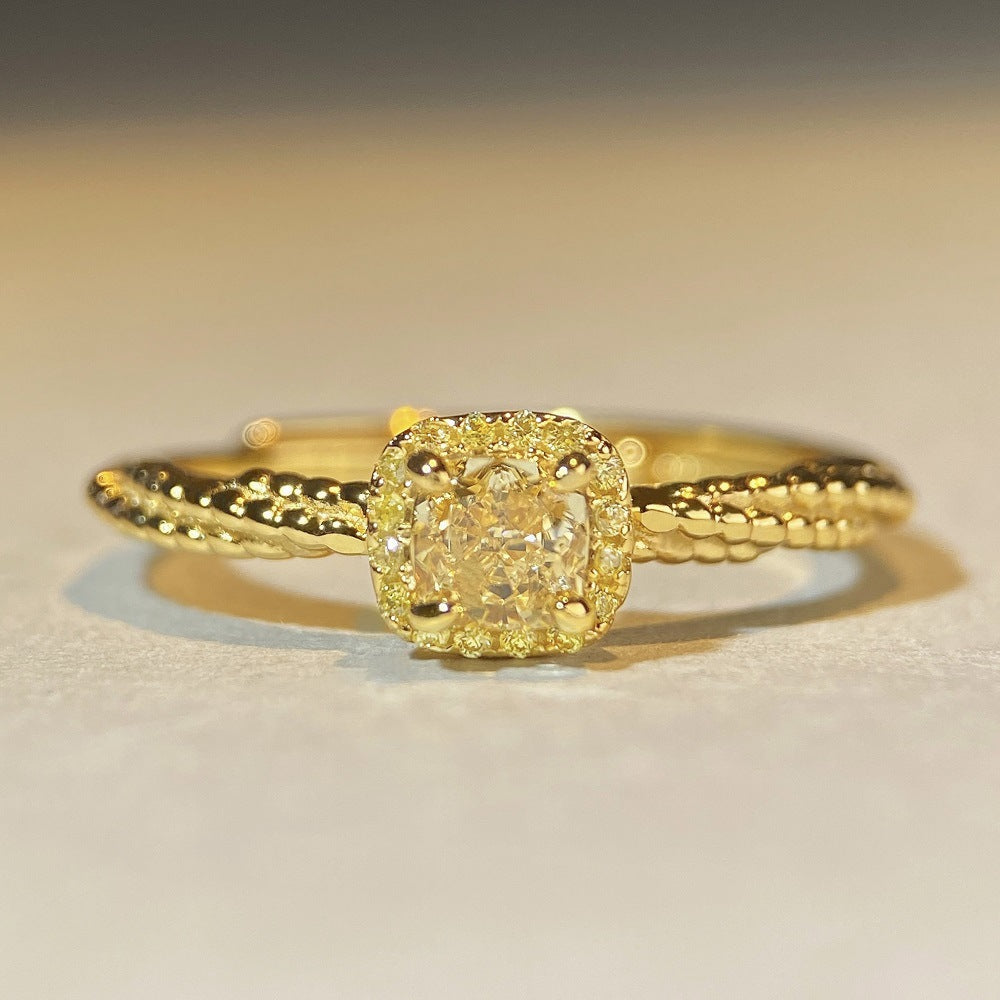 Sterling silver cube yellow diamond ring refers to a small fresh and simple ring.