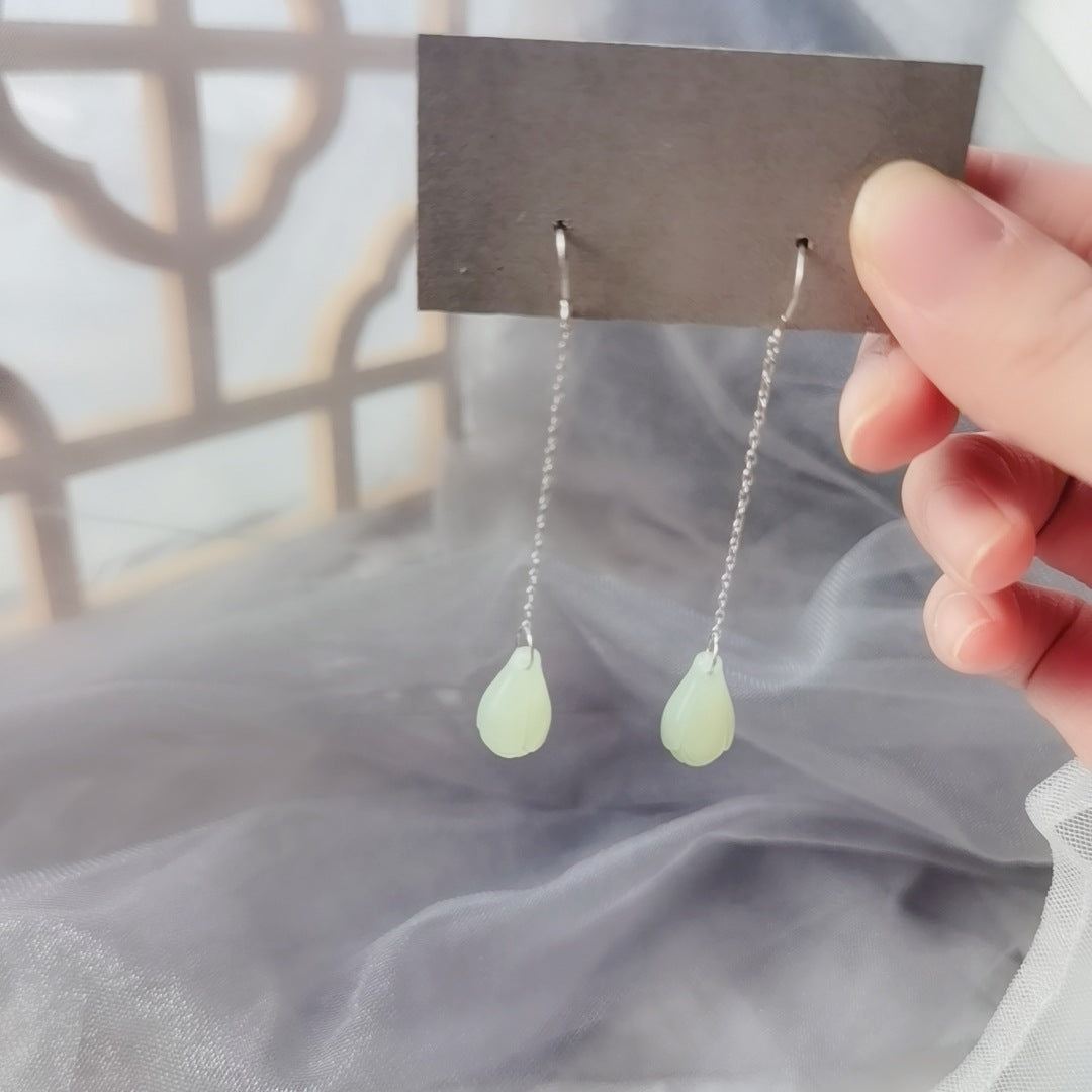 Hetian jade magnolia earrings S925 tremella hook