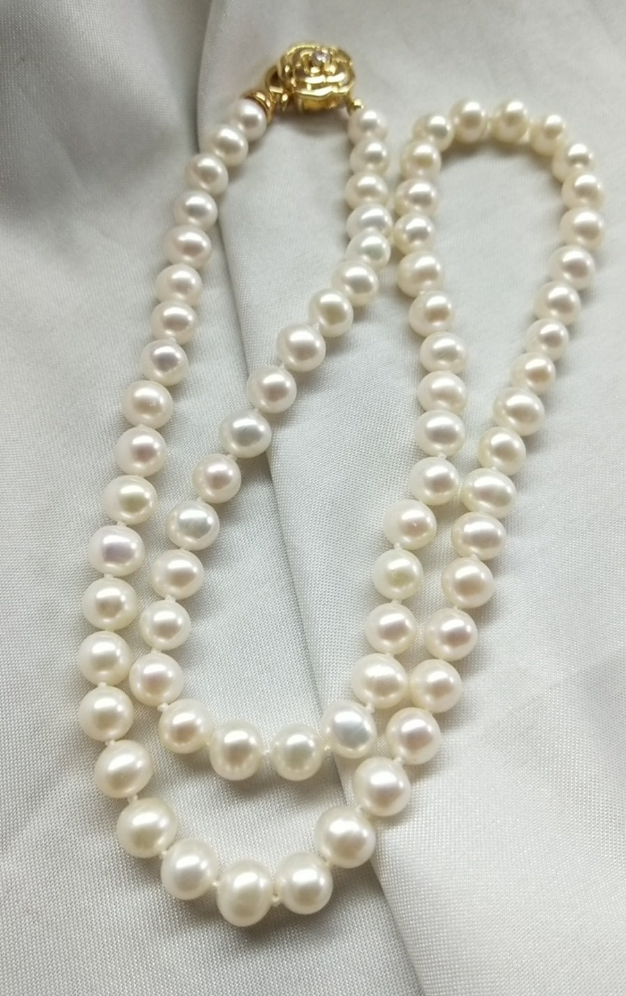 "Elegant Camellia" 6-7mm Near-Round High-Quality Freshwater Pearl Necklace - Graceful 50cm Necklace with Adjustable Clasp.