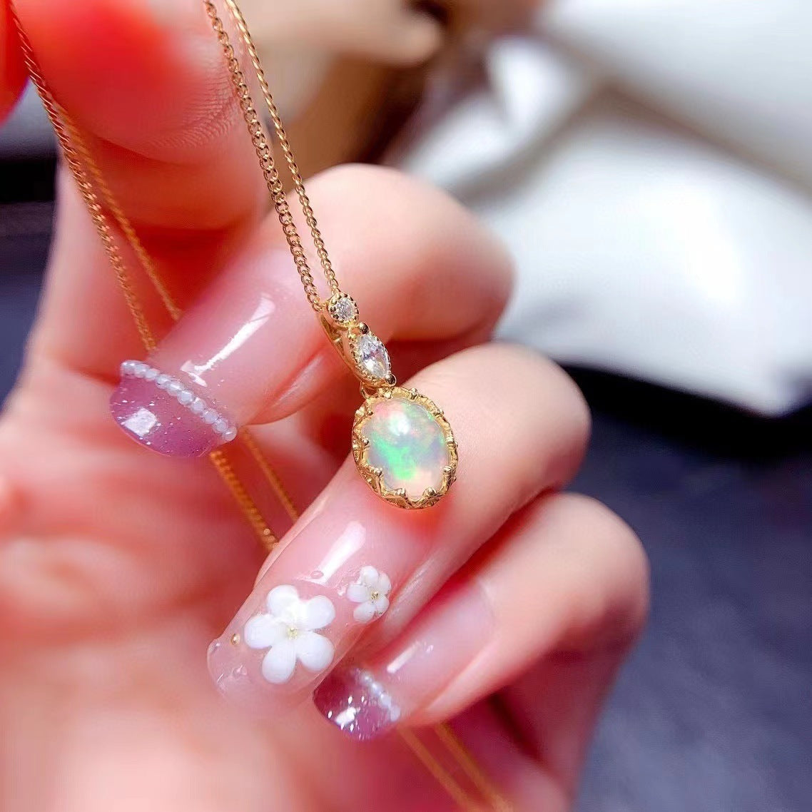 Natural opal set set with -set temperament ring pendant